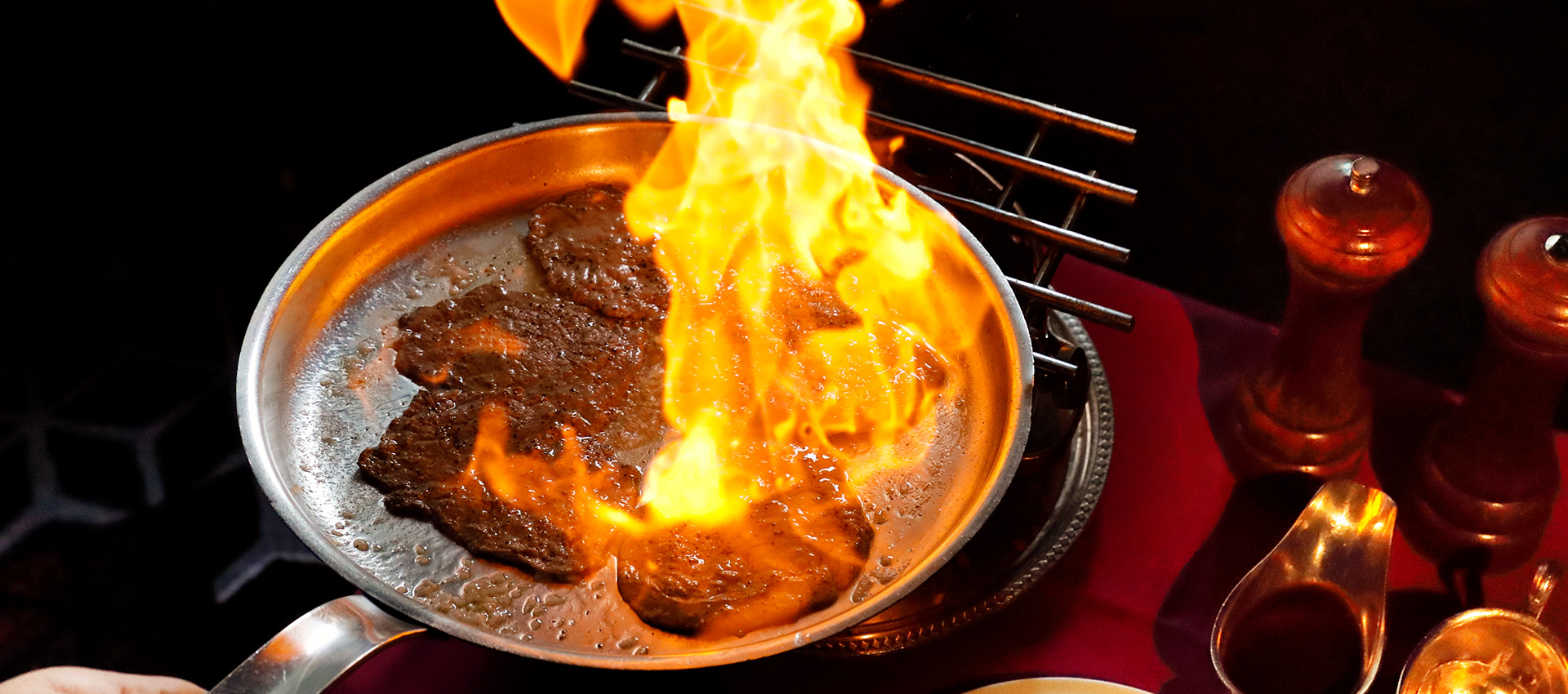 Paper Thin Filet of Beef Flambé Course